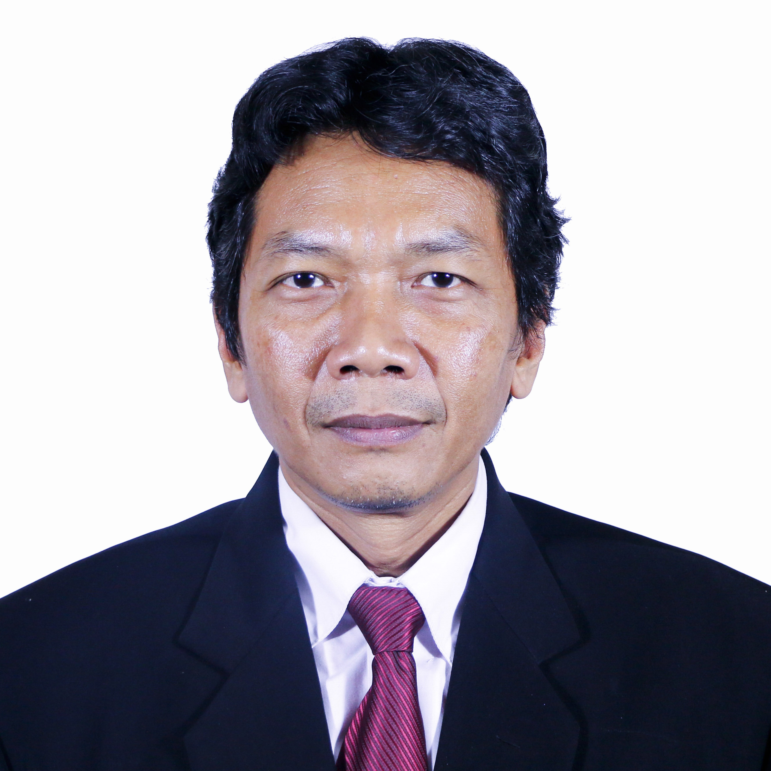 Drs. Iqmal Tahir, M.Si